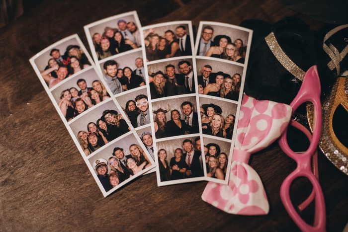 Freshly printed photo strips on a table